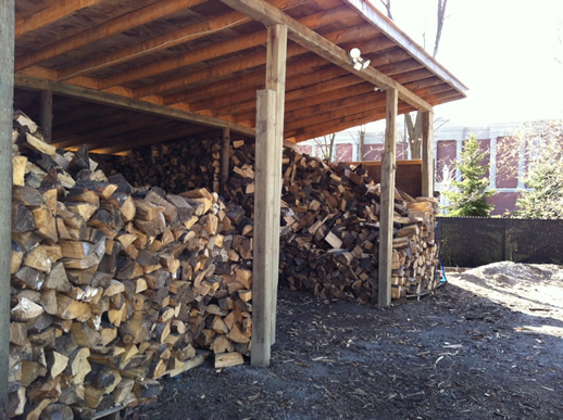 Image of stacked wood at the ETC yard